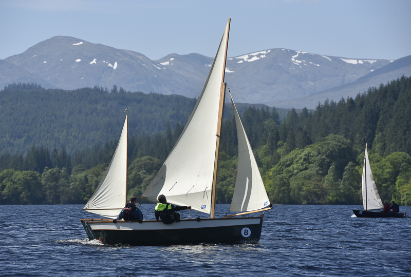 a small yacht sailing in Scotland
