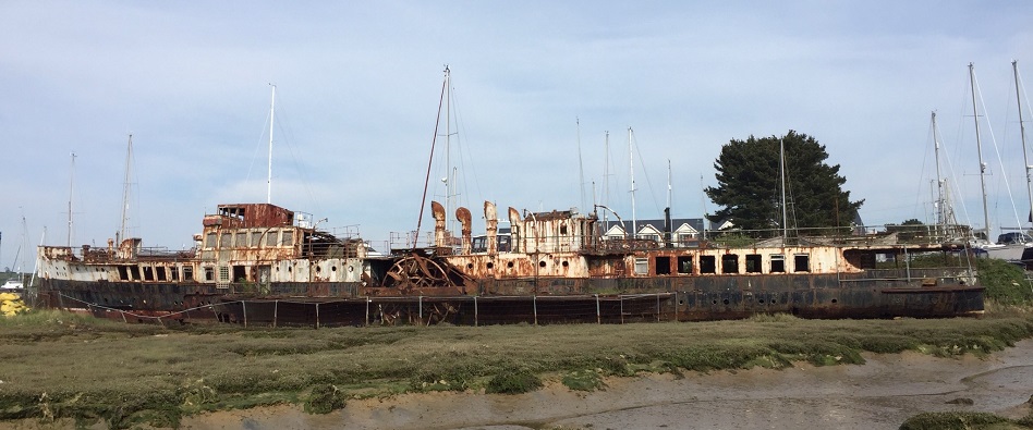 rusting medway paddle steamer on the shore