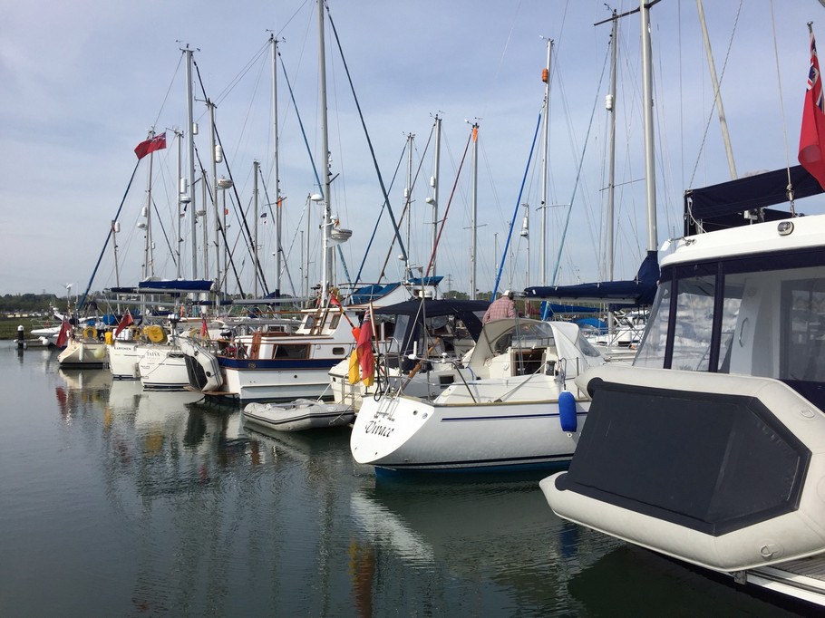stern view of yachts moored in Island Harbour Marina